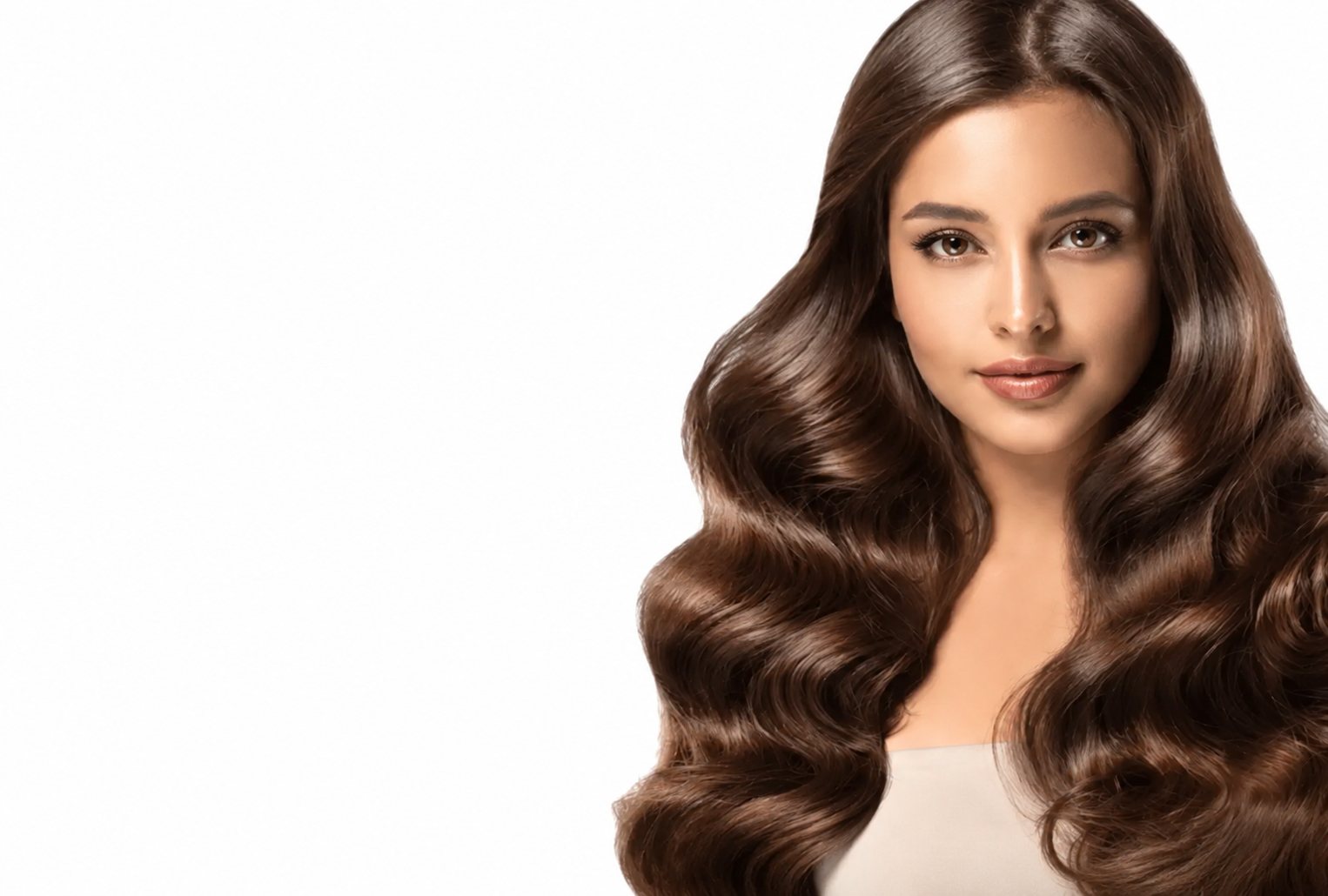 Woman with long, glossy brown waves